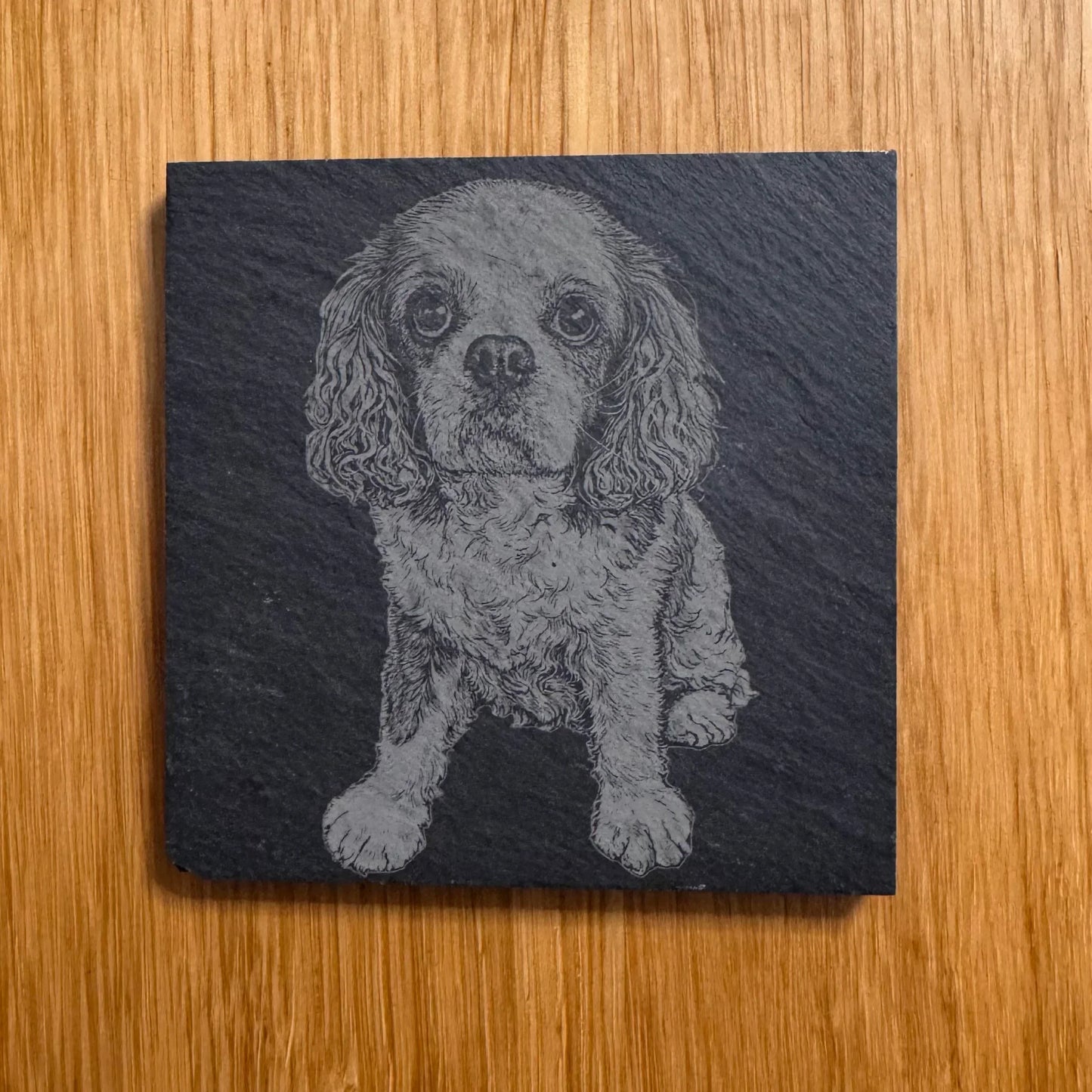 Slate coaster with engraved Cavalier King Charles Spaniel, perfect for dog lovers and unique gifts.