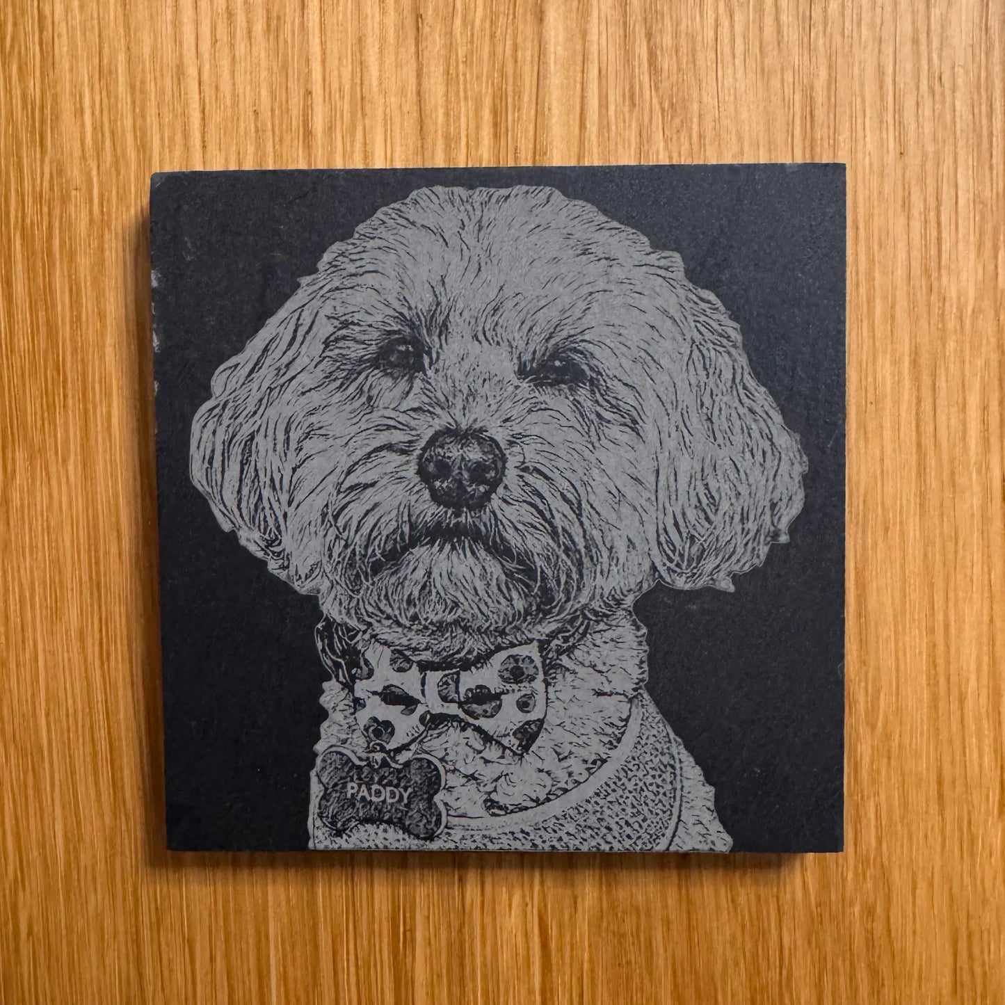 Personalised slate coaster with engraved dog portrait named Paddy, perfect pet gift