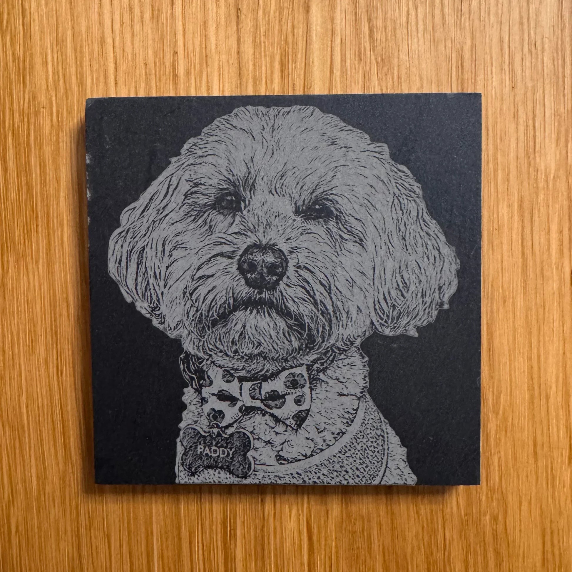Personalised slate coaster with engraved dog portrait named Paddy, perfect pet gift