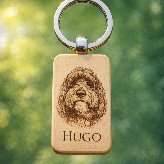 Personalised wooden keyring with engraved dog portrait and name Hugo, perfect thoughtful gift